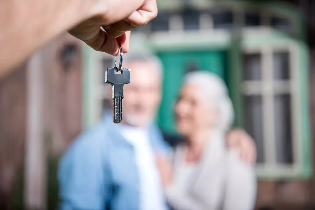 Saleman holding keys